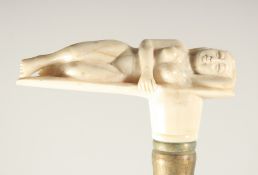 A CARVED BONE HANDLE WALKING STICK 