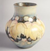 WILLIAM MOORCROFT SALT LEAF AND GRAPE VASE. Initials, W. M., impressed Moorcroft. 4.75ins high.