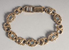 A VICTORIAN 9CT GOLD AQUAMARINE BRACELET.