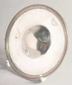 A GEORGE III SILVER CIRCULAR WINE FUNNEL STAND with reeded edge. 4ins diameter. London 1801.