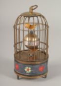 A SMALL BIRD CAGE CLOCK. 6ins high.