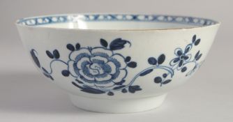 A LIVERPOOL BOWL painted with a large peony in blue.