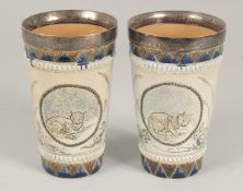 A PAIR OF HANNAH BARLOW DOULTON STONEWARE TAPERING BEAKERS with silver lips, Birmingham, 1893,