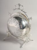 AN ENGRAVED CIRCULAR CHEESE AND BISCUIT STAND.