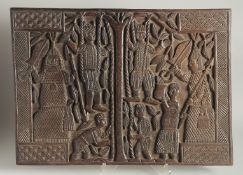 A WELL CARVED BENIN WOOD PANEL formed as two connecting panels of figures. 19ins & 26ins.