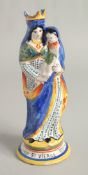 A MAJOLICA POTTERY FIGURE 