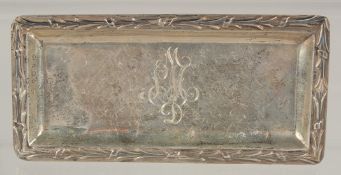 A SILVER PIN TRAY. 5ins long. Birmingham 1909.
