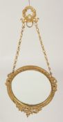 A GILT METAL CIRCULAR PHOTOGRAPH FRAME 3.5ins.