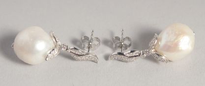 A PAIR OF SILVER BAROQUE PEARL DROP EARRINGS.