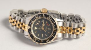 A LADIES' ZODIAC STAINLESS STEEL PROFESSIONAL 200 METAL WRIST WATCH. 106 23. 26. No. 882.