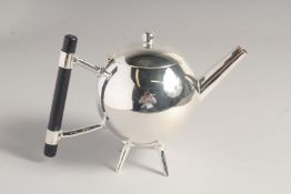 A SMALL CHRISTOPHER DRESSER DESIGN GLOBULAR SILVER PLATED TEA POT.