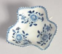 A LIVERPOOL LEAF SHAPED, painted in blue with three flower sprays, probably Christians' factory.