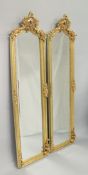 A PAIR OF FRENCH STYLE GILTWOOD TALL DRESSING MIRRORS. 5ft 10ins high x 1ft 9ins wide.