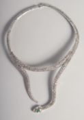 A SILVER EMERALD MARCASITE SNAKE NECKLACE.