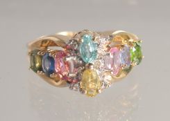 A 14CT MULTI STONE RING
