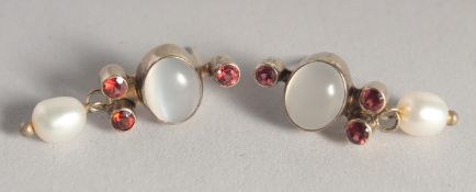 A PAIR OF SILVER GILT AND MOONSTONE EARRINGS.