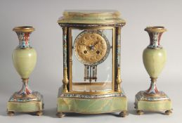 A GOOD 19TH CENTURY FRENCH ONYX AND CHAMPLEVE ENAMEL CLOCK GARNITURE, the clock with serpentine