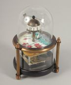 A SMALL FISH CLOCK. 5.5ins high.