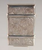 A VICTORIAN ENGRAVED SILVER VESTA. 1.5ins x 1in. Birmingham 1895.