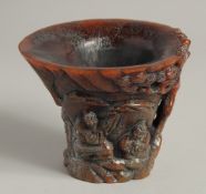 A GOOD CARVED HORN LIBATION CUP.