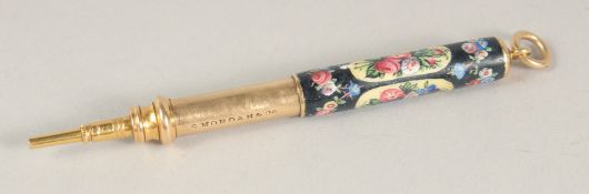 A MORDEN & CO. 18ct. GOLD AND ENAMEL PENCIL.
