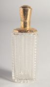 AN 18CT GOLD TOP, CUT GLASS SCENT BOTTLE.