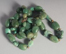 A JADE AND TURQUOISE NECKLACE.