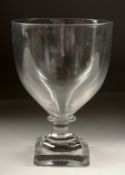 A PLAIN LARGE 18TH CENTURY GLASS RUMMER on a square base. 6.25ins high. Provenance: Delomosne &