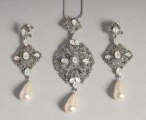 A SILVER MOTHER OF PEARL MARCASITE NECKLACE AND EARRINGS.