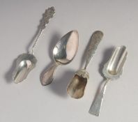 FOUR VARIOUS SILVER CADDY SPOONS.