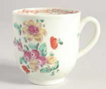 A LIVERPOOL CHAFFERS FACTORY COFFEE CUP with strap handle painted with English flowers in colour.