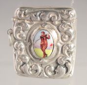 A VESTA with an oval in enamel of a golfer. 1.75ins x 1.5ins.