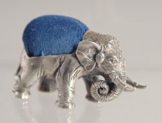 A SILVER ELEPHANT PIN CUSHION.
