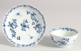 A LIVERPOOL TEABOWL AND SAUCER painted with a pattern used on feather moulded tea wares.