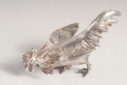 A VICTORIAN CAST SILVER COCKEREL PEPPER POT. London 1882, maker: E. W. S.