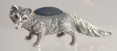 A SILVER FOX PIN CUSHION