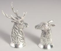 A PAIR OF SILVER PLATED DEER SALT AND PEPPERS.