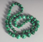 A MALACHITE NECKLACE.