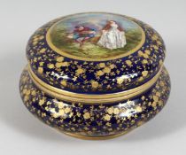 A GOOD 19TH CENTURY SHAPED PORCELAIN CIRCULAR BOX AND COVER, blue and gilt ground, the lid painted