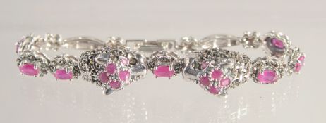 A SILVER RUBY SET MARCASITE PANTHER BRACELET.