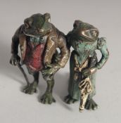 A BRONZE GROUP, MR & MRS TOAD. 2.25ins high.