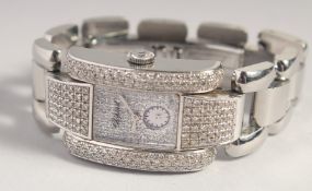 A DIAMOND SET CHOPARD LA STRADA WRISTWATCH with papers and spare links. No. 41/ 8380 1093723 8357.