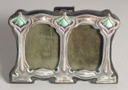 A SMALL SILVER DOUBLE PHOTOGRAPH FRAME 3ins x 4ins.