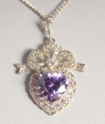 A SILVER HEART SHAPED C Z PENDANT AND CHAIN.