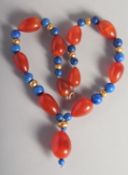 A CORNELIAN AND LAPIS NECKLACE.
