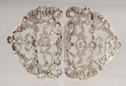 A NURSE'S SILVER BUCKLE, London, 1899.