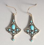 A PAIR OF 9CT GOLD TURQUOISE SET SEED PEARL EARRINGS.
