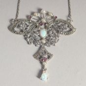 A SILVER OPAL AND RUBY NECKLACE.