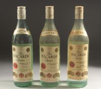THREE BOTTLES OF LIGHT DRY BACARDI.