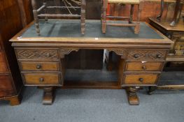 An oak pedestal desk.